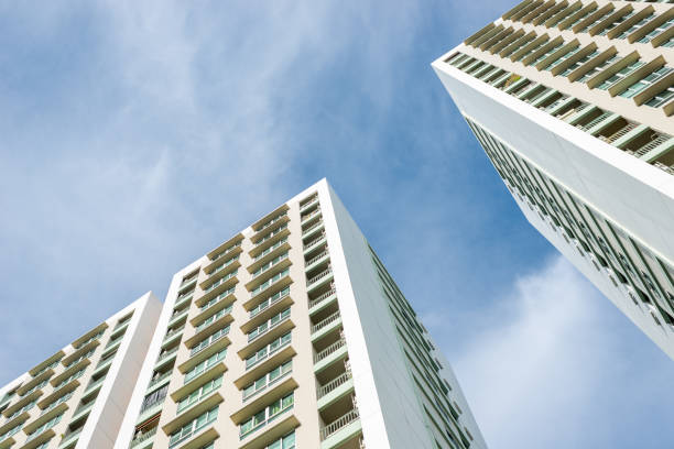 istock Residential high-rise buildings against blue sky with cloud 841588876