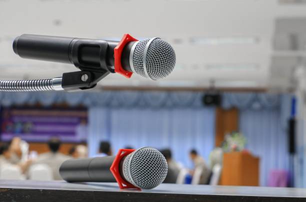 istock microphone Close up in conference room :Select focus with shallow depth of field. 841600112