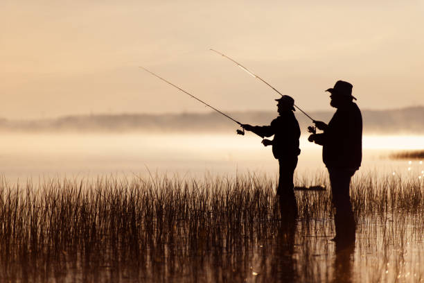 week-end activities between senior brothers - fishing active seniors family senior adult imagens e fotografias de stock