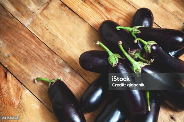 Several Ripe Eggplant Lay On Boards Stock Photo - Download Image Now - Agriculture, Autumn, Beauty