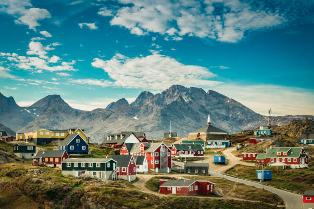 Picturesque village in Greenland with colorful houses Idyllic village in beautiful setting greenland photos stock pictures, royalty-free photos & images