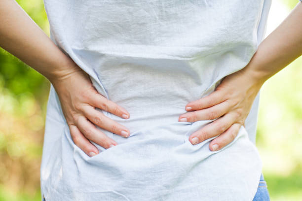istock Pregnant woman with lower back pain 841621392