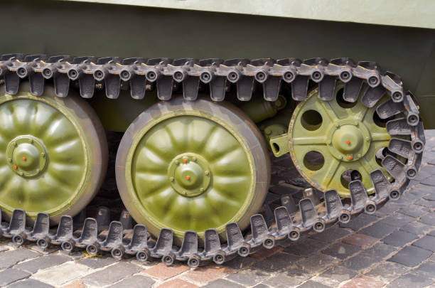 istock Tank tracks and steel wheels huge green panzer 841621900