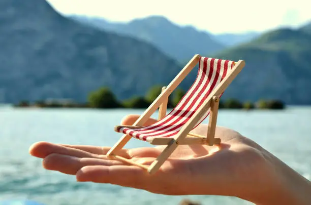 little beachchair in the hand close up