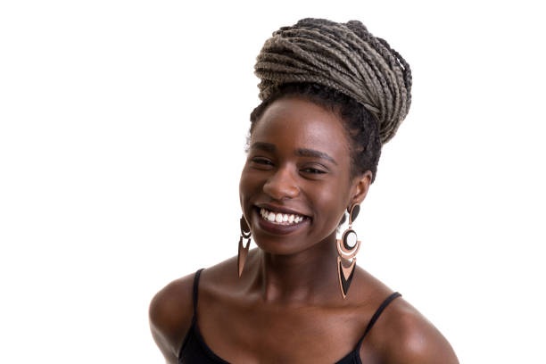 istock Young black woman with afro hairstyle smiling 841624686