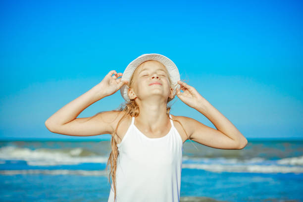 istock Happy little Girl on the beach. 841629484