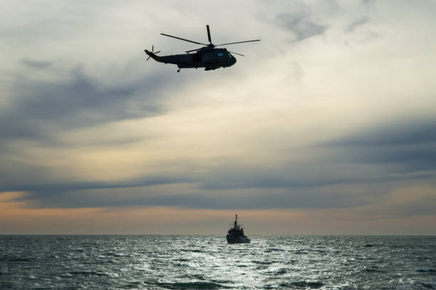 istock Helicopter flying on the sea 841632792