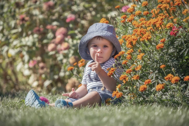 Young girl enjoying flowers