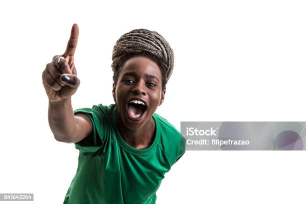 Soccer Afro Young Woman Celebrating On Green Uniform Isolated On White Background Stock Photo - Download Image Now