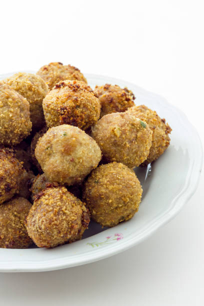 istock Fried meat meatballs in oil 841643458