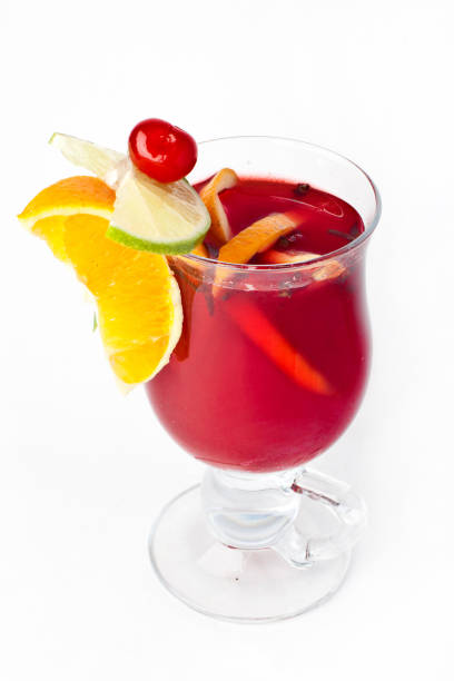 istock red coctail with orange and spices on white background 841653794
