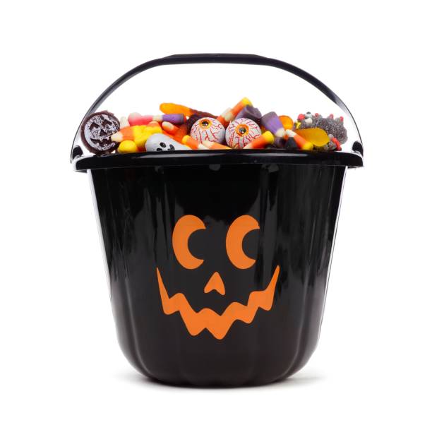 istock Black Halloween Jack o Lantern candy collector over white 841654074