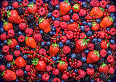 Berries overhead closeup assorted mix in studio on dark background