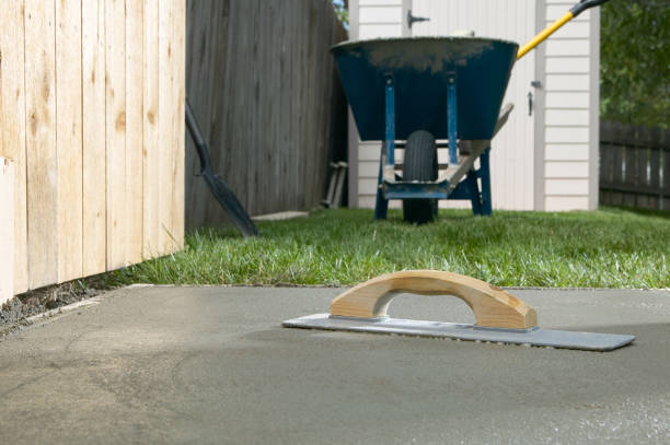 Cement screed on concrete slab in backyard project stock photo