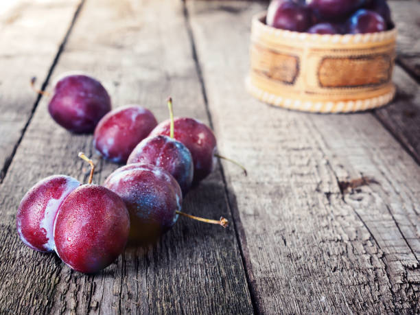 istock Fresh ripe plum prunes crop harvest 841663960