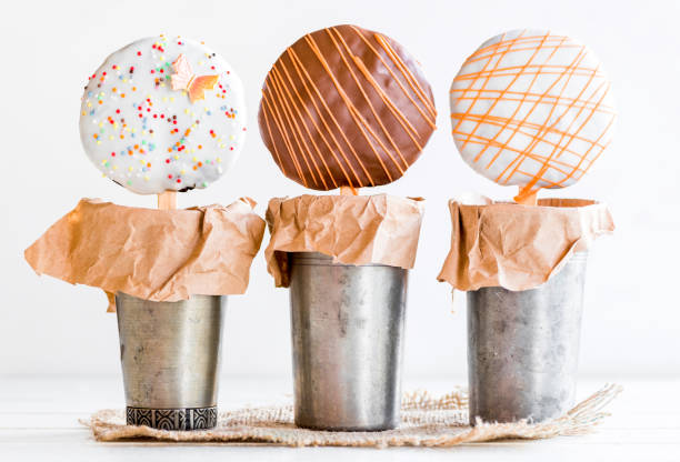 sweet cookies on the stick - flavored ice variation birthday candy imagens e fotografias de stock