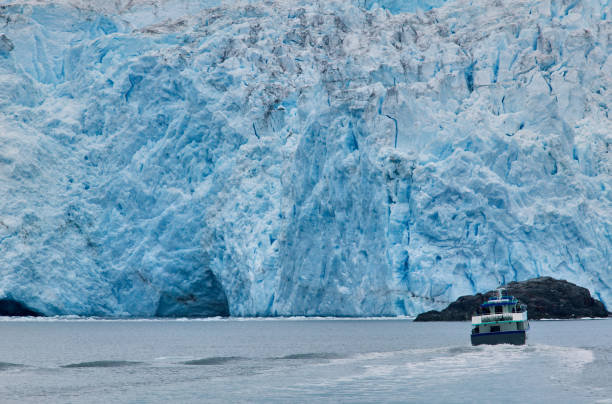 boat against glacier at prince william sound, usa - prince of wales imagens e fotografias de stock