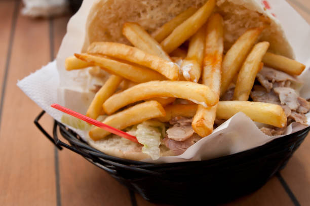 istock doner kebab with french fries 841676530