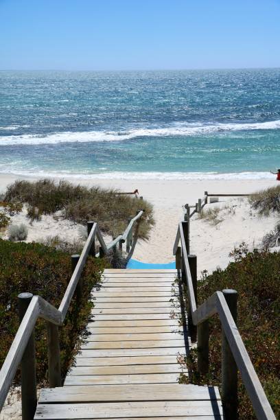 Stairs to Cottesloe Beach at Indian Ocean in summer, Western Australia Stairs to Cottesloe Beach at Indian Ocean in summer, Western Australia cottesloe beach stock pictures, royalty-free photos & images