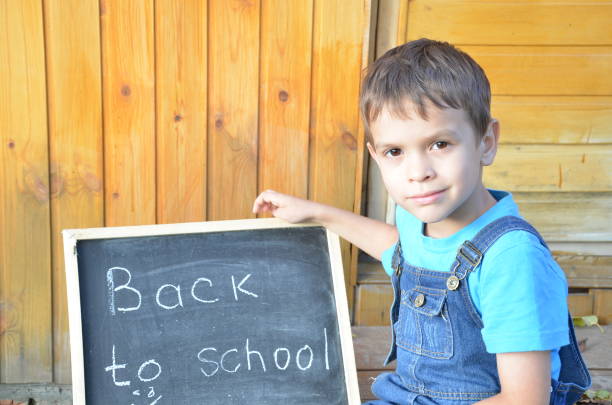 istock joyful little boy with backpack ready for school, back to school concept 841677394