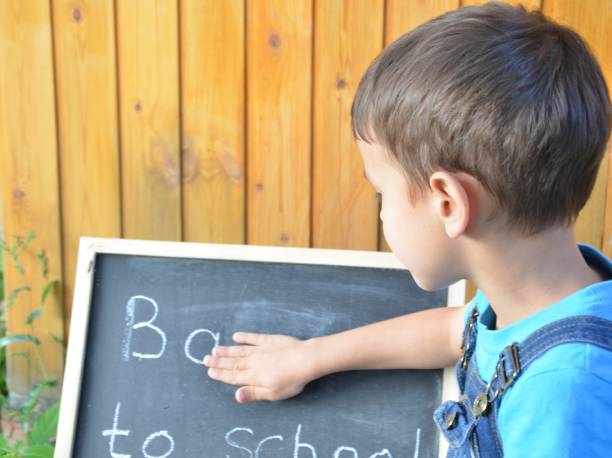 istock joyful little boy with backpack ready for school, back to school concept 841677440