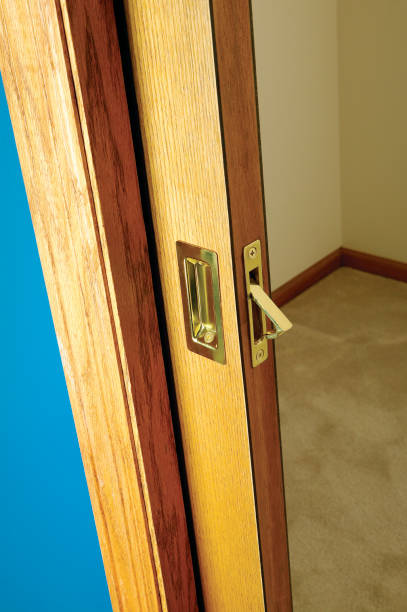 istock Open wooden pocket door slid back into the wall 841680174