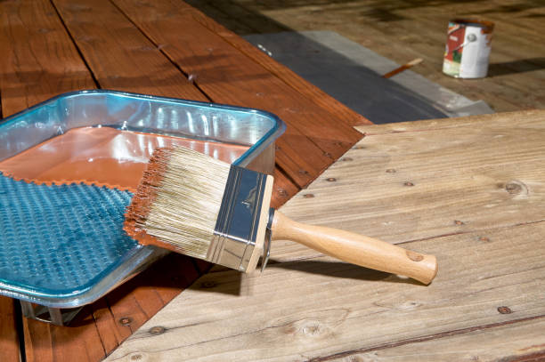 Diy concept of varnishing a floor stock photo