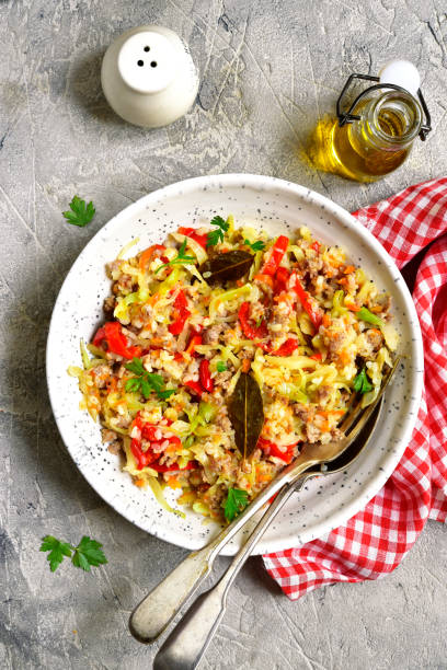 istock Cabbage stewed with bell pepper,minced meat and rice 841683660