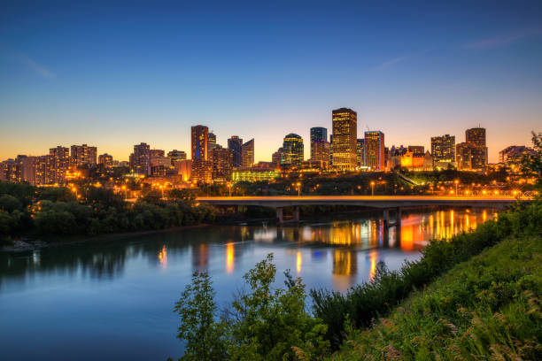 Edmonton downtown and the Saskatchewan River at night stock photo