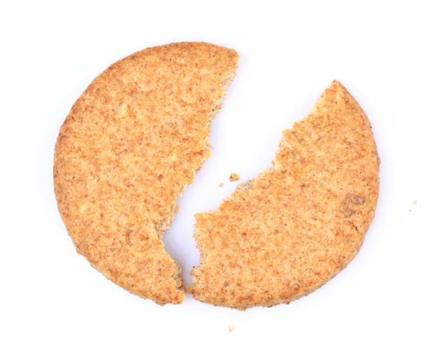 istock Broken Scottish oatcake isolated on white from above. 841702494