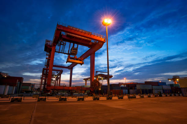 istock Beautiful night under the port container terminal 841724414