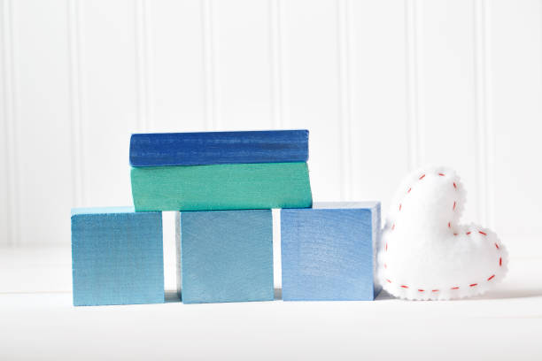 blue wooden blocks with heart cushion - cushion pillow heart shape multi colored imagens e fotografias de stock