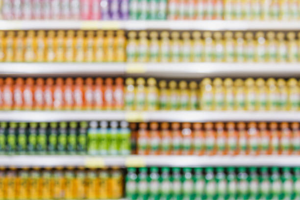 istock Supermarket with beverage product shelves blur background 841744468