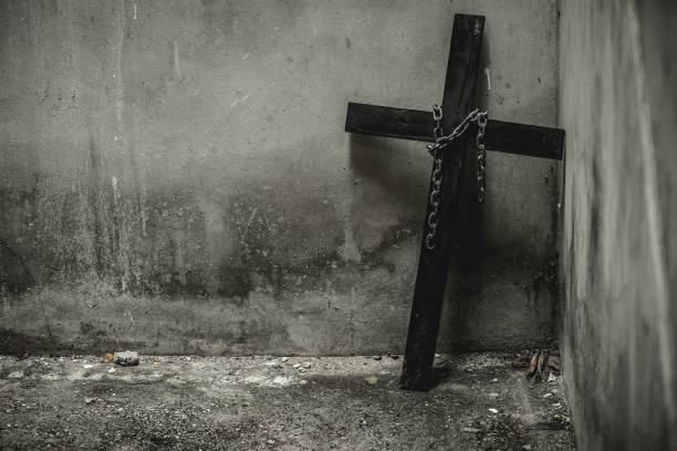 istock Black cross with a looped chain. 841745454