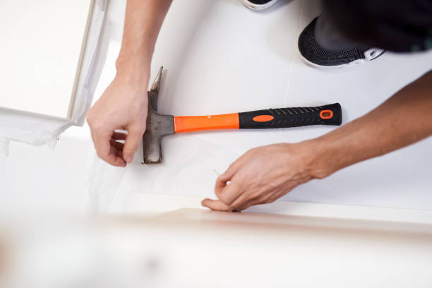 istock craftman hands near hammer 841746306