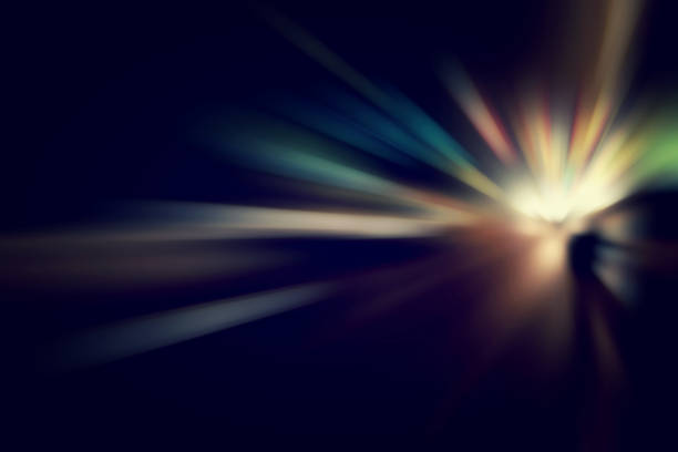 Blurry Illumination and night lights, car traffic motion blur the speed and dynamics