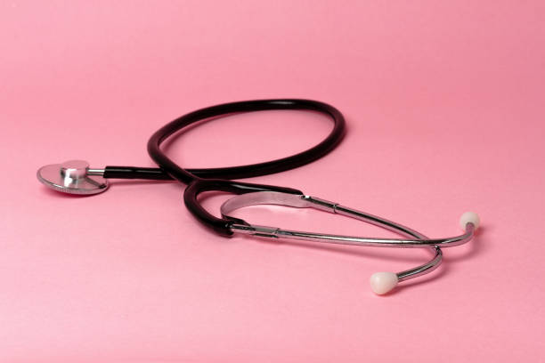 istock Medical stethoscope isolated on pink background 841752554