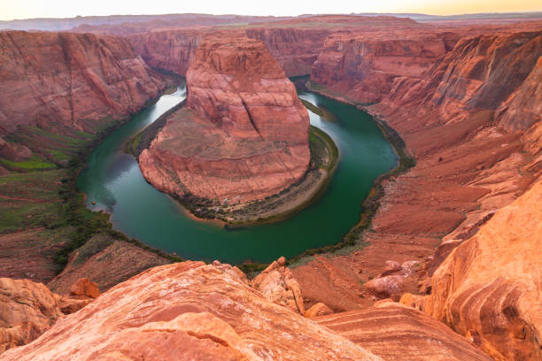istock Horseshoe Bend scenery, under warm sunrise light 841758540