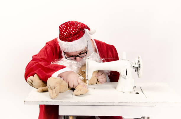 santa claus y máquina de coser. estilo retro. navidad. - 13576 fotografías e imágenes de stock