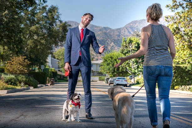 istock Living with Pets - Businessman Walking the Dog Before Work 841762102