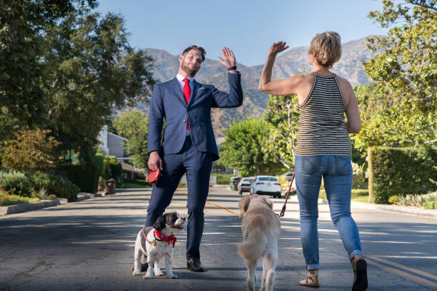 istock Living with Pets - Businessman Walking the Dog Before Work 841762596