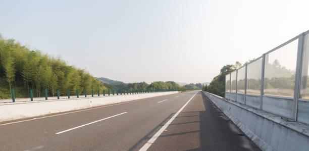 istock highway in motion blur under sunny day 841766116
