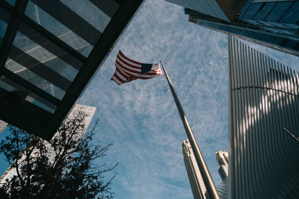 Corporate Building in Manhattan and american flag