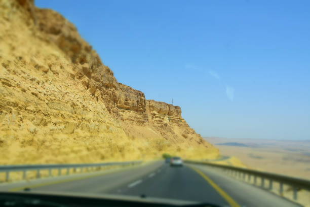 istock driving in the desert 841773332