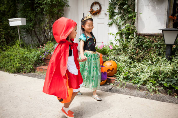 istock Two girls walking hand in hand with each other. 841791624