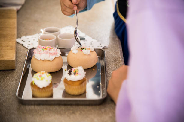 Girls wearing costumes make sweets happily on Halloween days.