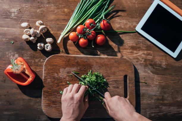 istock top view of man cooking with tablet 841799642