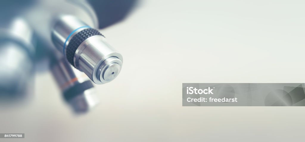 Optical microscope - science and laboratory equipment. Microscope is used for conducting planned, research experiments, educational demonstrations in medical and health institutions, lab. Microscope Stock Photo