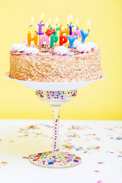 istock colorful birthday cake with candles 841806192
