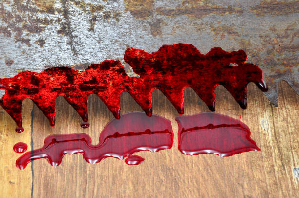 saw with blood stock photo